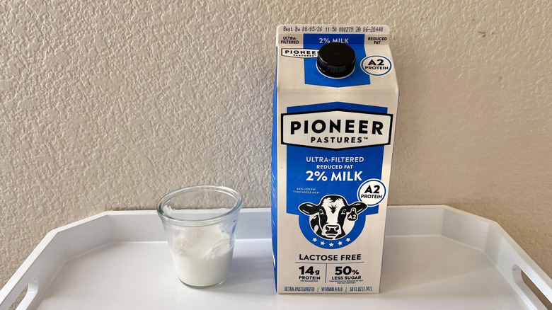 Pioneer Pastures Lactose Free 2% A2 carton on a small tray