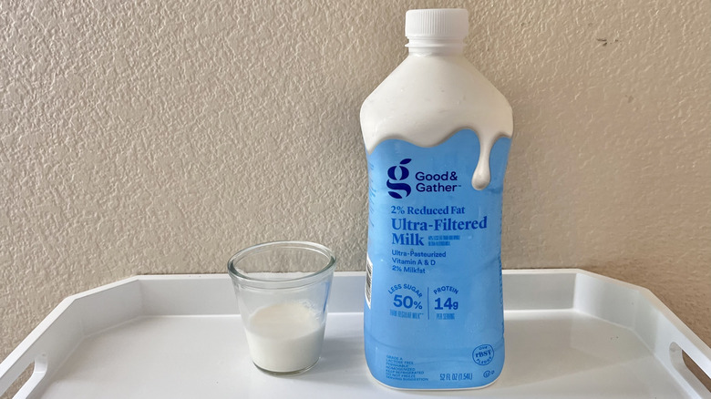 Good and Gather 2% Ultra-Filtered Milk carton with a glass of milk
