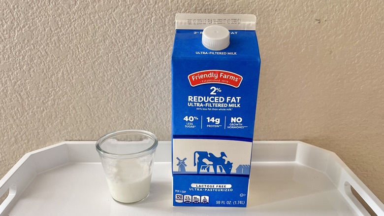 Friendly Farms 2% Ultra-Filtered Milk carton with a glass of milk