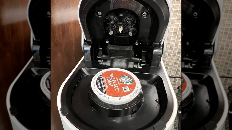 The pin of a Keurig coffee maker, which needs regular cleaning