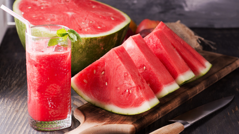 Watermelon juice and sliced watermelon.