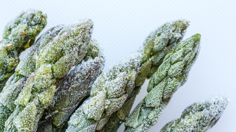close up of frozen asparagus spears