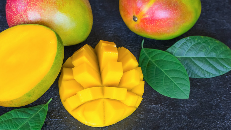 Mangoes, whole and cut