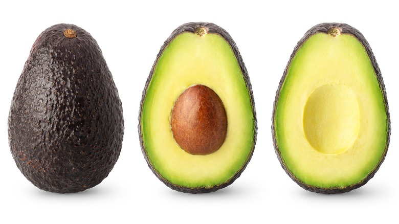 Avocados with skin and pit