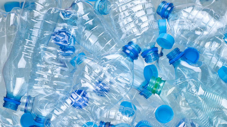 Close-up of many empty plastic water bottles