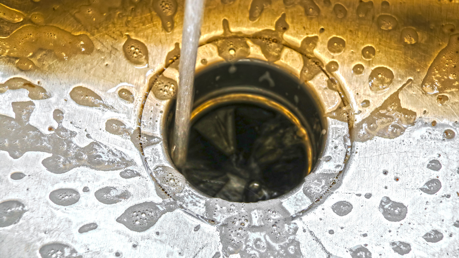 Is It Safe To Use Hot Water In A Garbage Disposal?