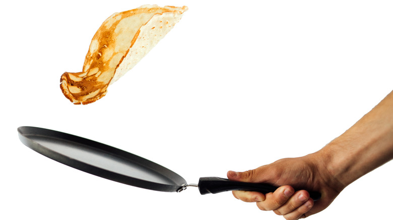 flipping a crepe