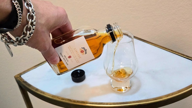 Pouring a taste of Jim Beam Lineage Batch #2 sample