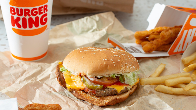 Burger King combo meal with Whopper, chicken strips, and fries