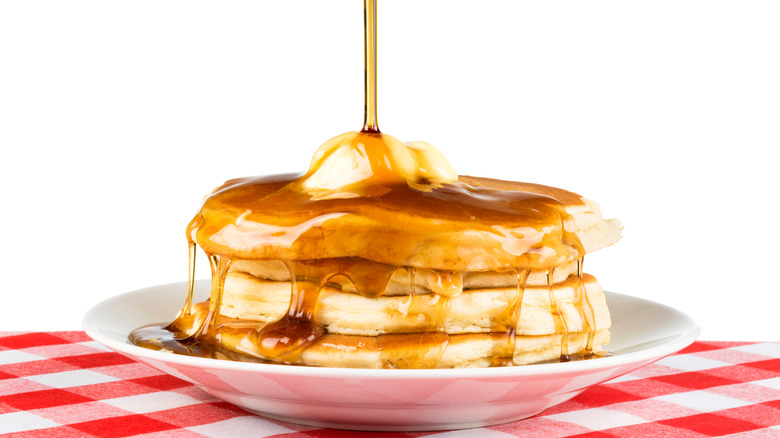 maple syrup on pancake stack