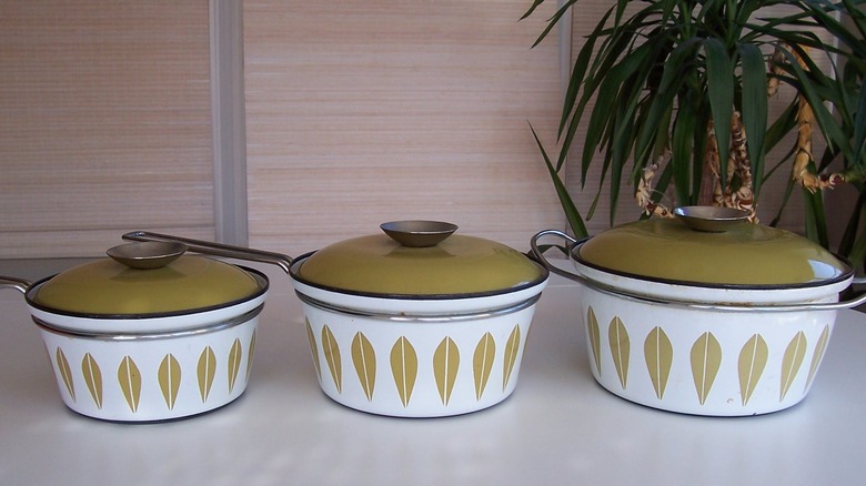 Three versions of Cathrineholm Lotus line pots with handles
