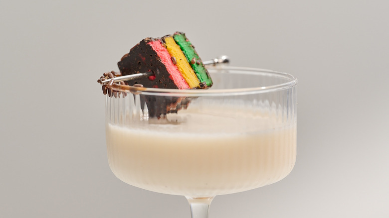 italian rainbow cookie martini on a table