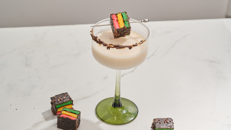 cocktail on table garnished with cookies