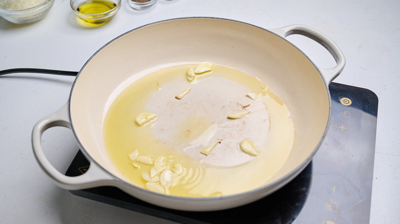 cooking garlic in a large skillet