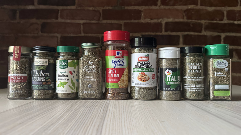 Italian seasoning blends on wooden table