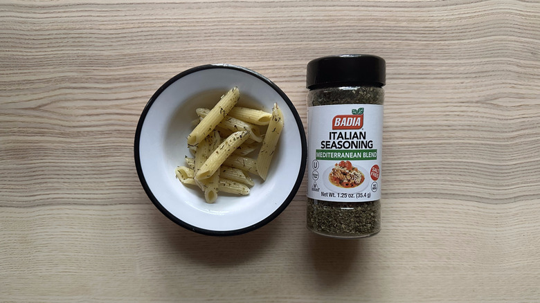 Badia Italian Seasoning Mediterranean Blend with pasta in white bowl