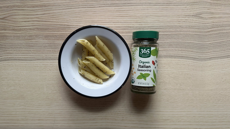 365 Organic Italian Seasoning with pasta in white bowl