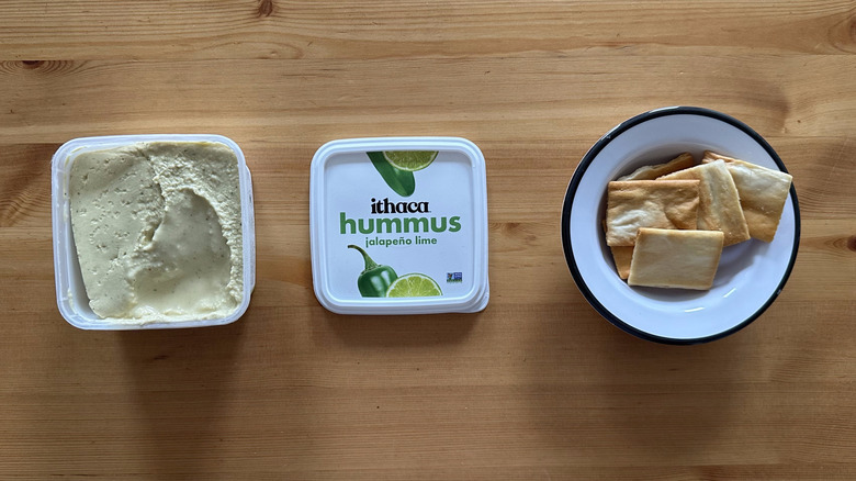 Ithaca Jalapeño Lime Hummus on wooden table with pita chips
