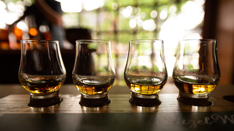 Tasting glasses filled with bourbon
