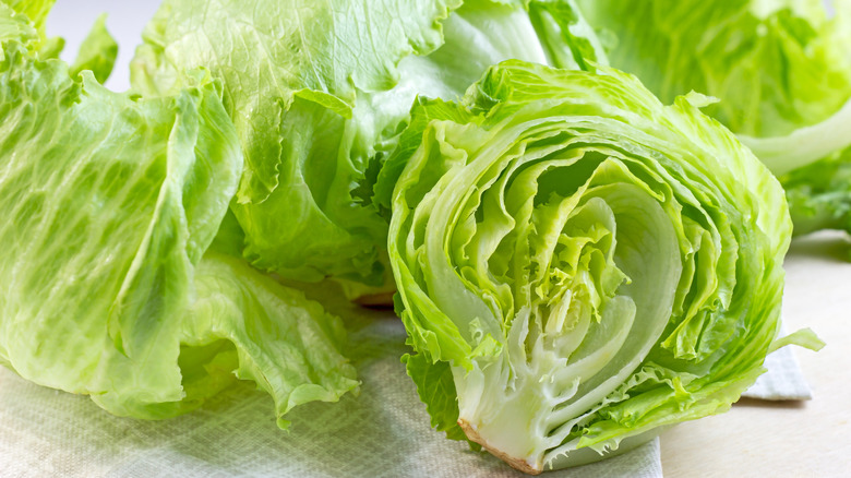 a head of iceberg lettuce cut opeen