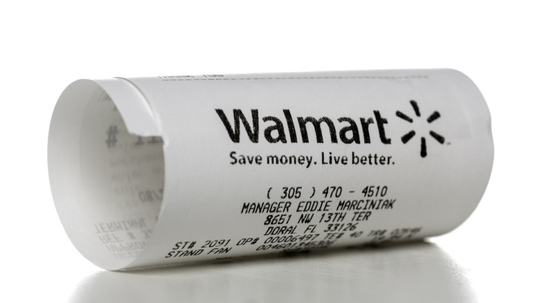 Rolled up Walmart receipt from Doral, FL