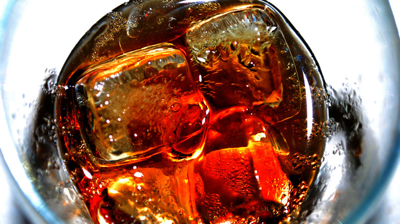 Cola glass with ice cubes