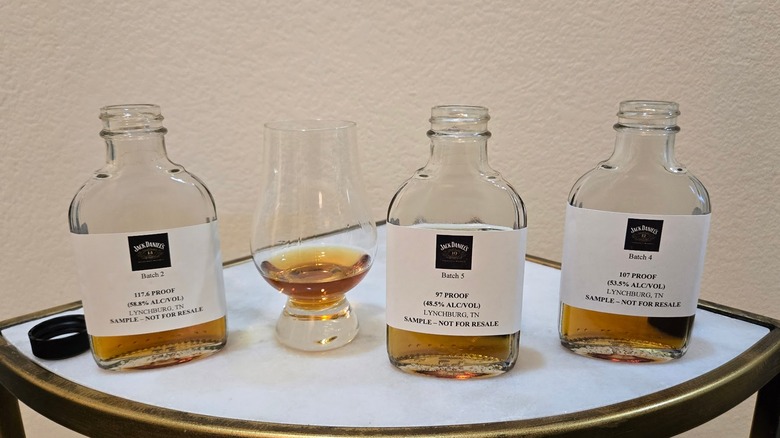 Sample bottles of Jack Daniel's age statement whiskies with Glencairn glass
