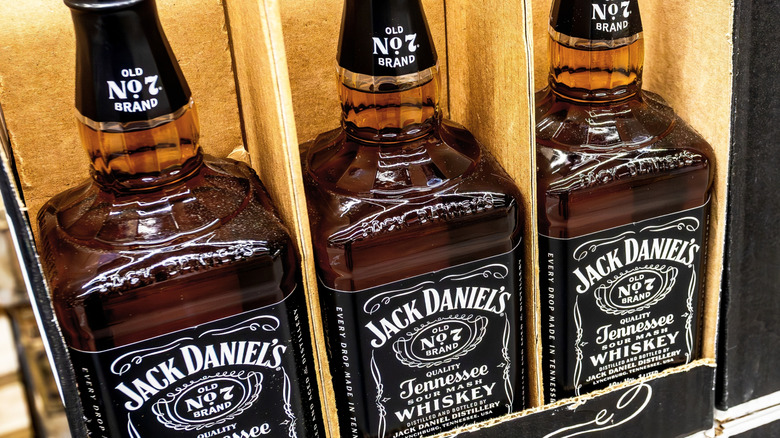 Several bottles of Jack Daniel's Old No. 7 Tennessee whiskey in a cardboard crate
