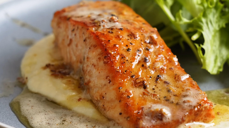 butter on cooked salmon