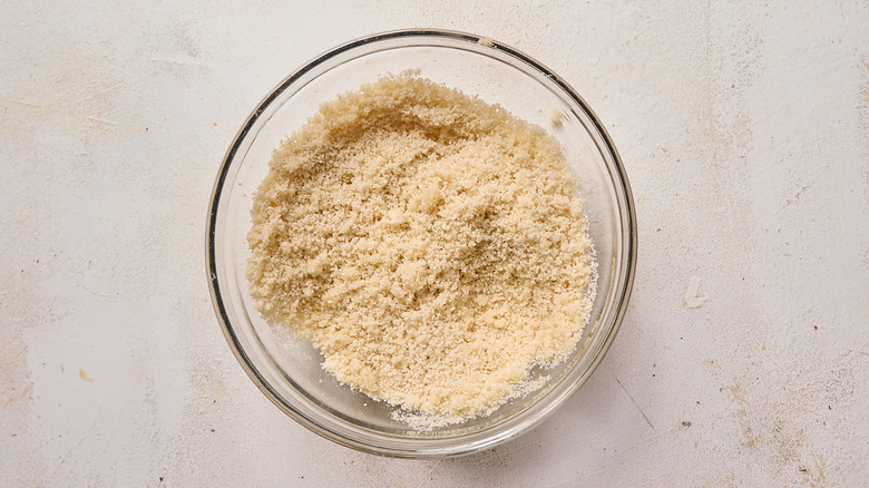 breadcrumbs coated in butter in a bowl