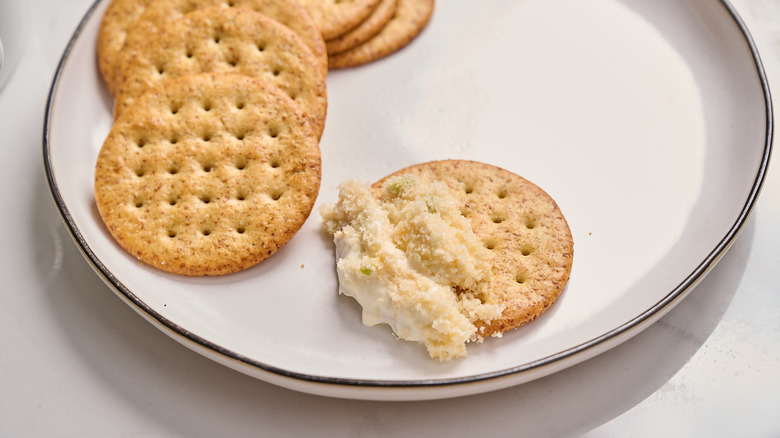cracker topped with jalapeno popper dip