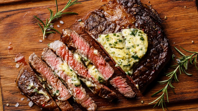 Juicy sirloin steak with compound butter