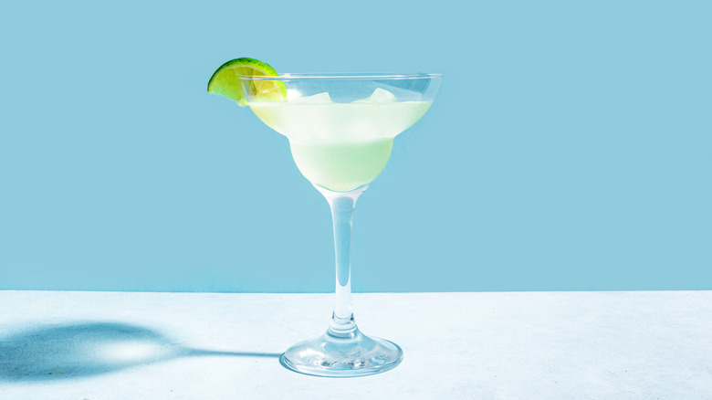 Margarita in stemmed glass with lime
