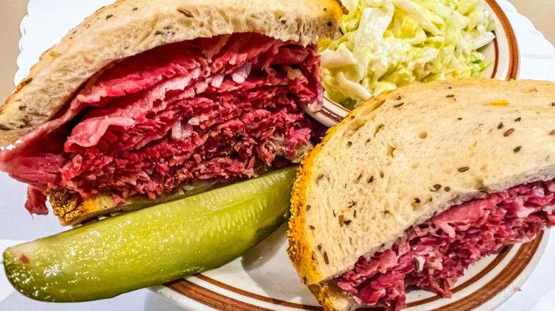 Corned beef sandwich and pickle