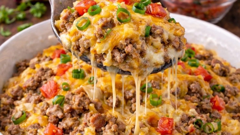 A spoonful of the John Wayne casserole with stringy cheese