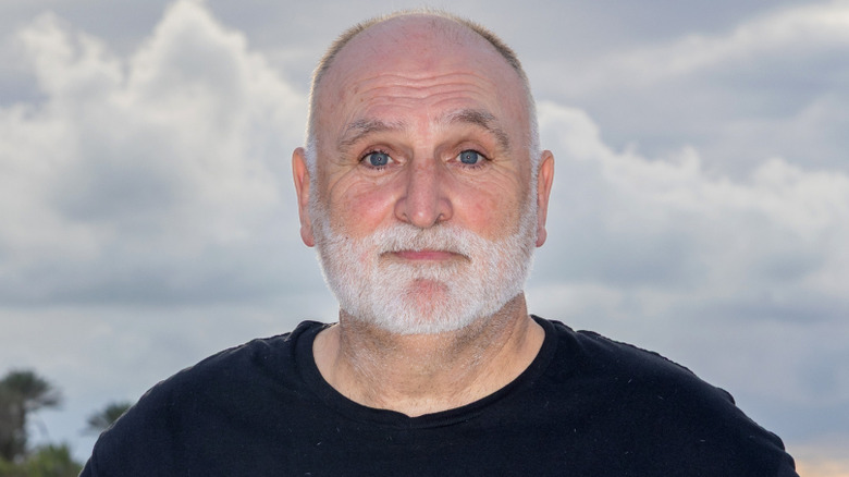 Jose Andres smiling on beach in black t-shirt