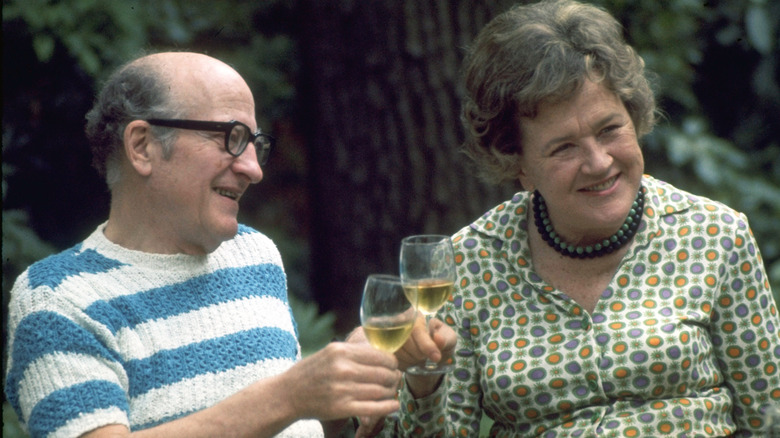 Julia and Paul Child toasting glasses