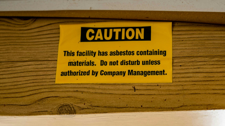An asbestos warning sign.