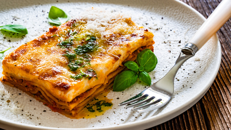 Lasagna cooked and placed on a white dish