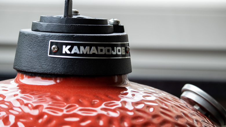 Close-up view of Kamado Joe branding on a Classic Joe grill
