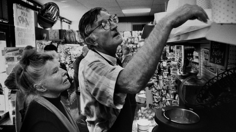 Older Katharine Hepburn shopping for groceries