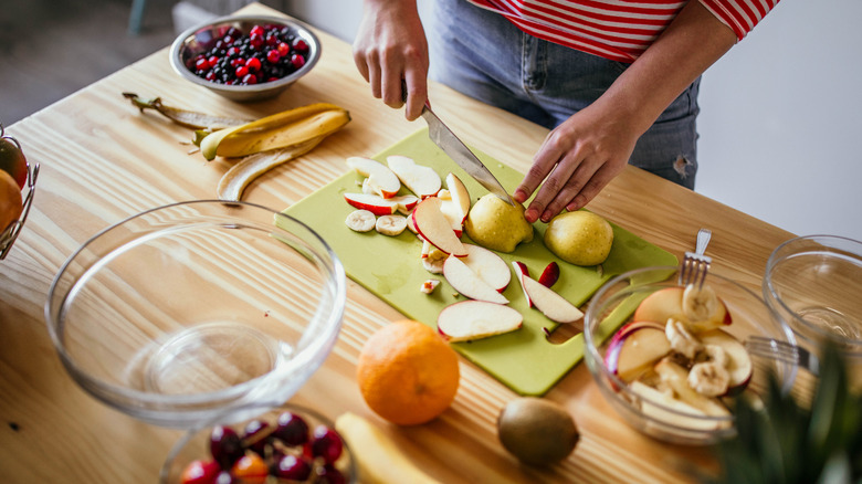 a pear being sliced