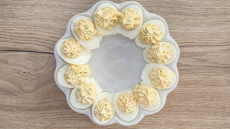 Deviled egg ring on wooden surface