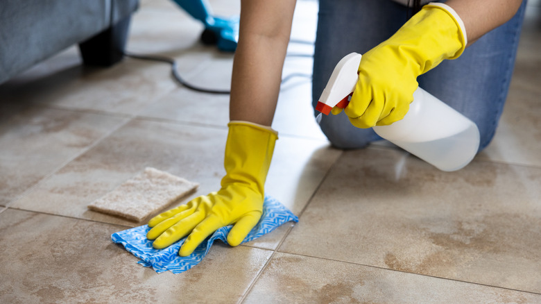 person cleaning floor