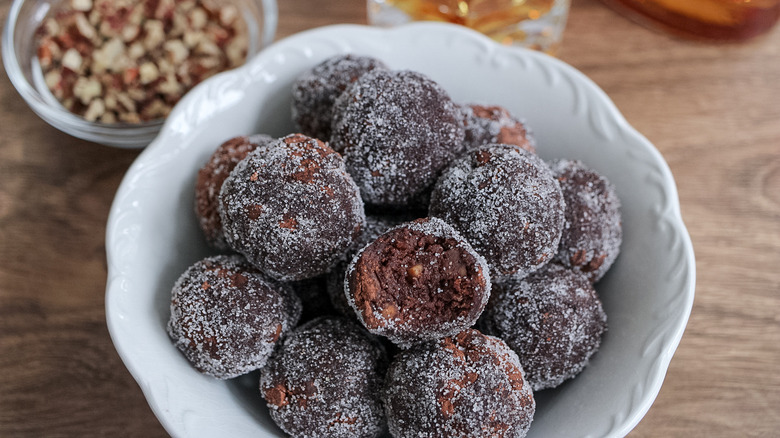 bourbon balls in white bowl