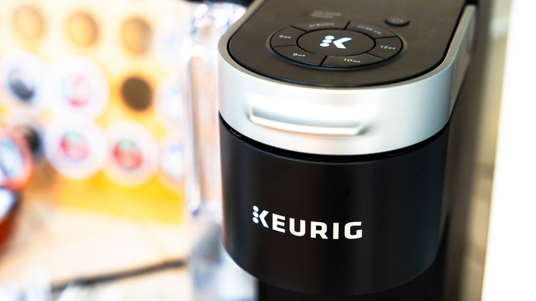 Close up of Keurig logo on coffee maker