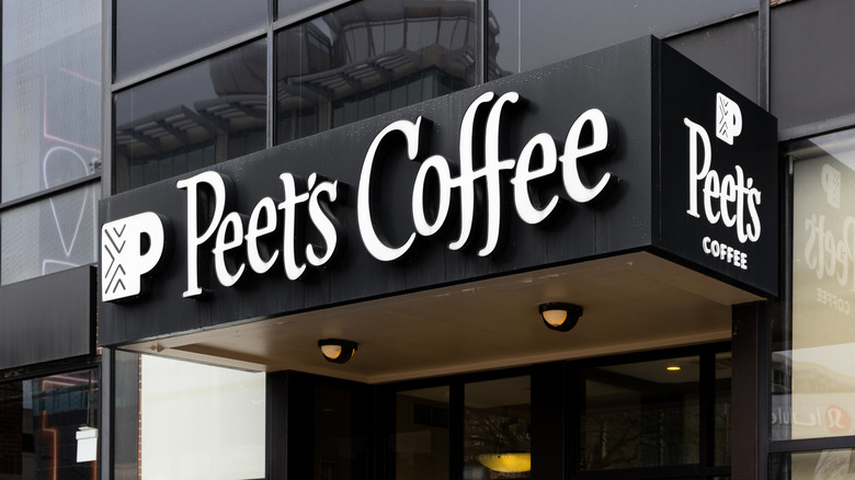 White Peet's Coffee sign above the coffee shop entrance