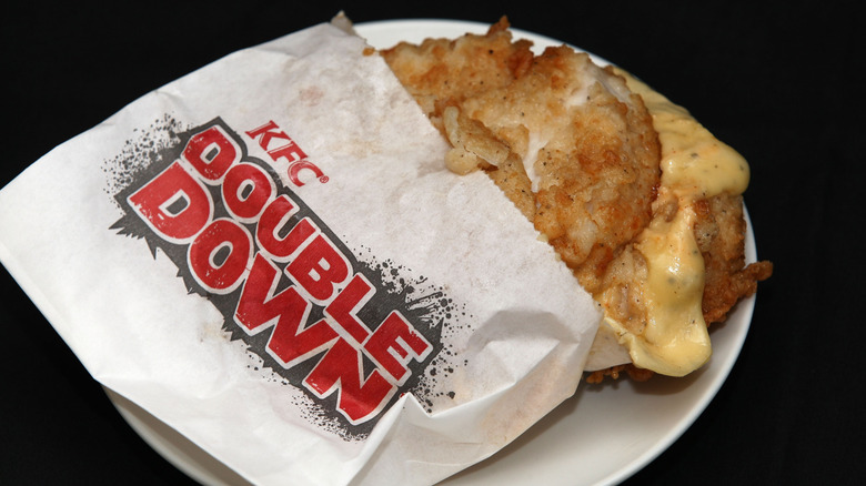 KFC Double Down sandwich in its wrapper with oozing cheese