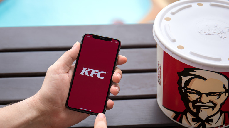 KFC app with bucket of chicken
