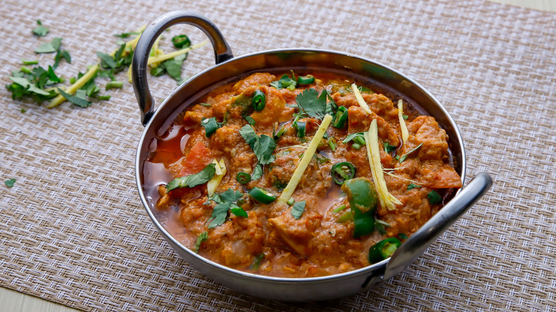 Chicken jalfrezi in metal dish